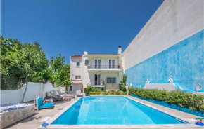 Stunning home in Lechaio Corinthias with Outdoor swimming pool, WiFi and 4 Bedrooms